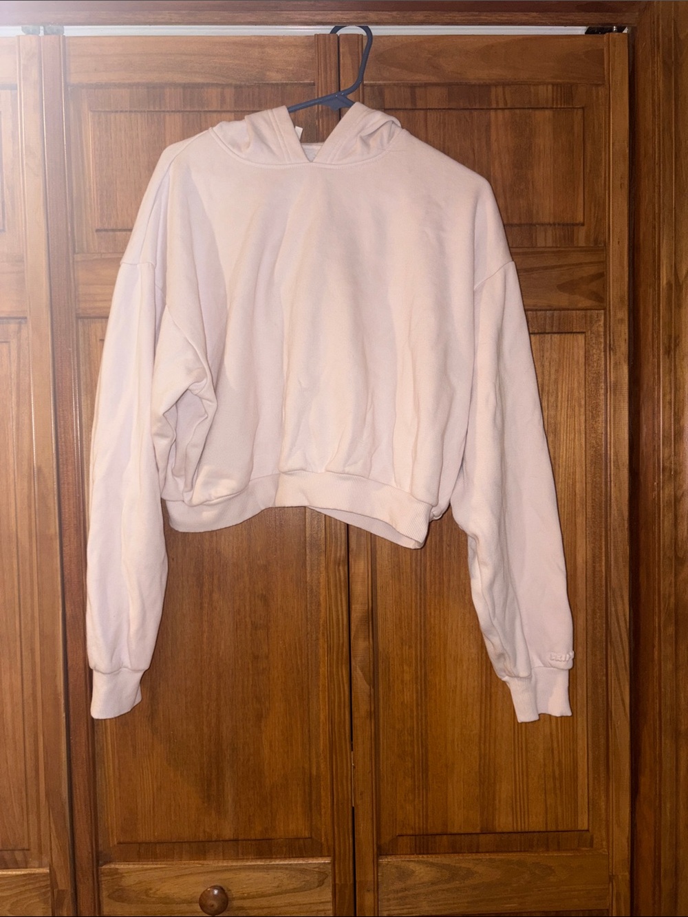 SKIMS Cropped Hoodie in Light Pink